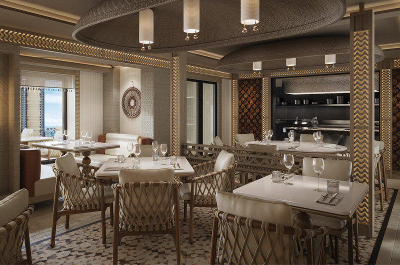 The image depicts an elegantly designed restaurant interior featuring intricate decor and modern furnishings. The setting includes well-arranged tables with glassware, soft lighting, and a view of the outside.
