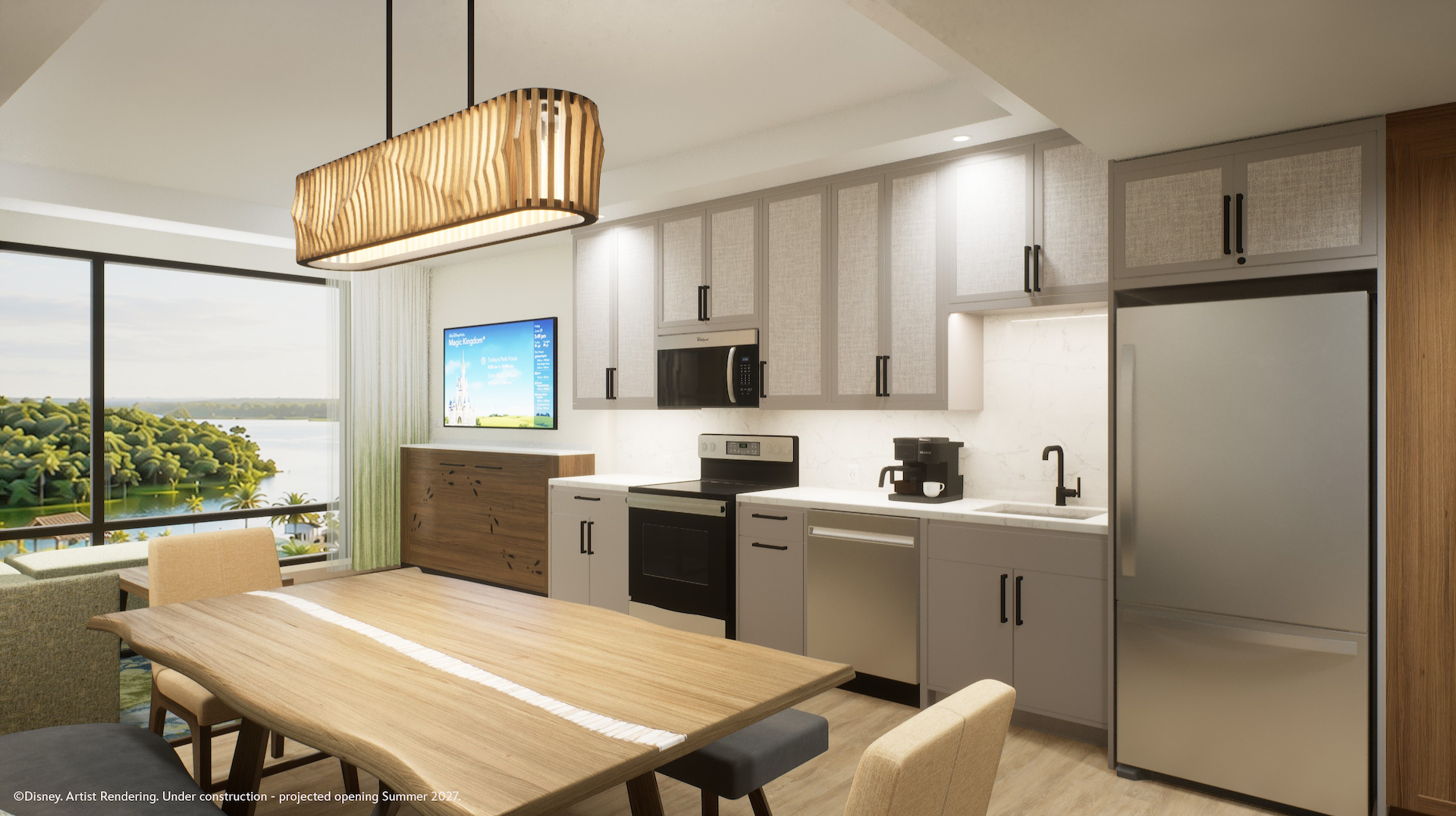 The image shows a modern kitchen and dining area within a stylish lodge, featuring contemporary appliances and cabinetry. Large windows offer a scenic view, emphasizing a tranquil lakeside environment.