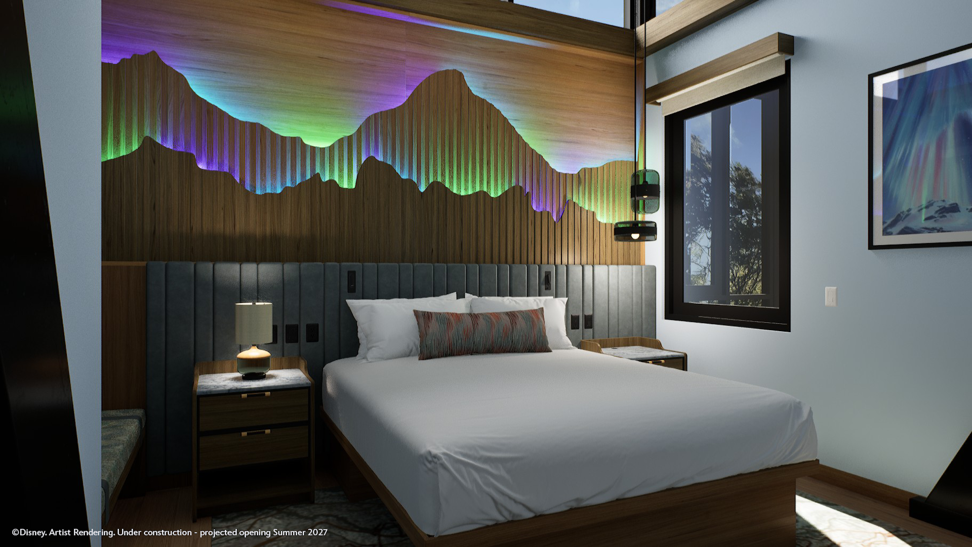 The image showcases a modern hotel guest room featuring contemporary design elements. A large bed is at the center, complemented by abstract mountain-themed wall artwork and ambient lighting that adds a colorful touch.